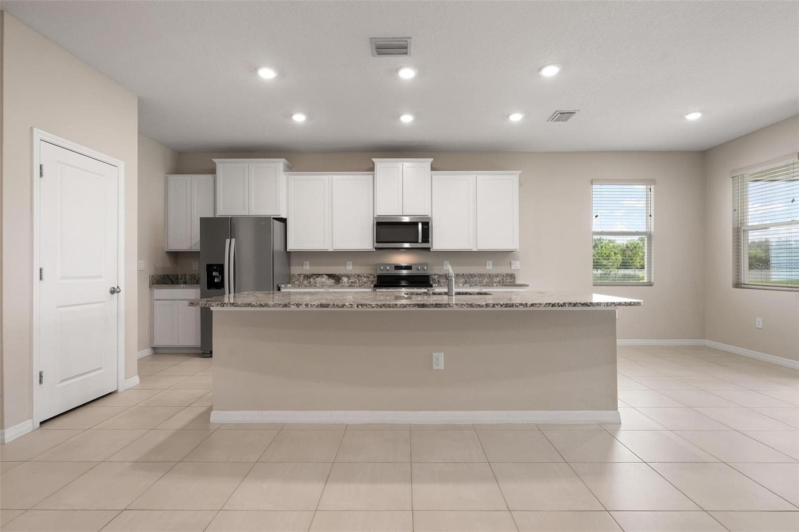 Pantry and granite counter tops in Kitchen - 431 158TH ST E, BRADENTON