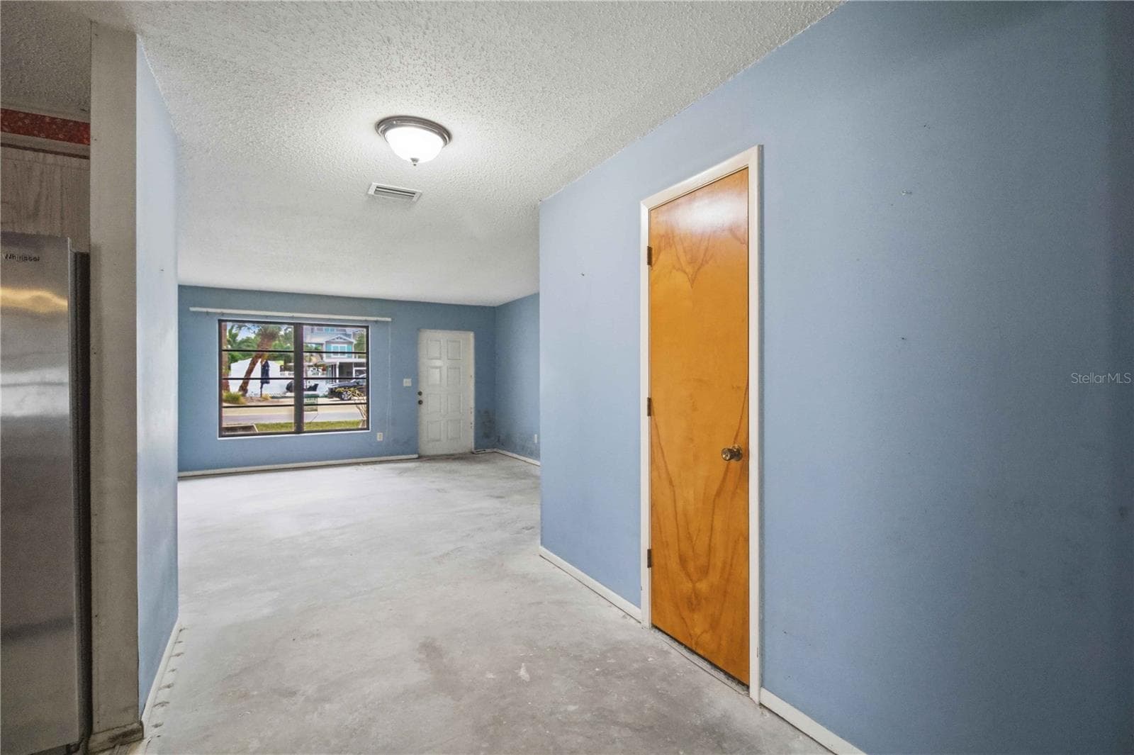 Hallway with pantry door - 306 PALM AVE, ANNA MARIA