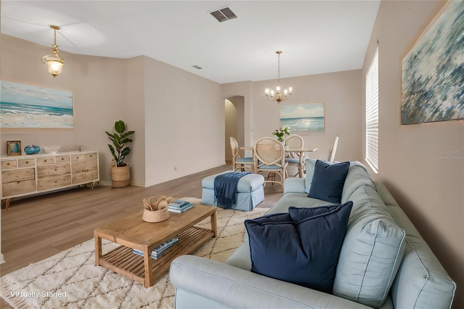 Virtually Staged living room - 525 HERON POINT WAY, DELAND