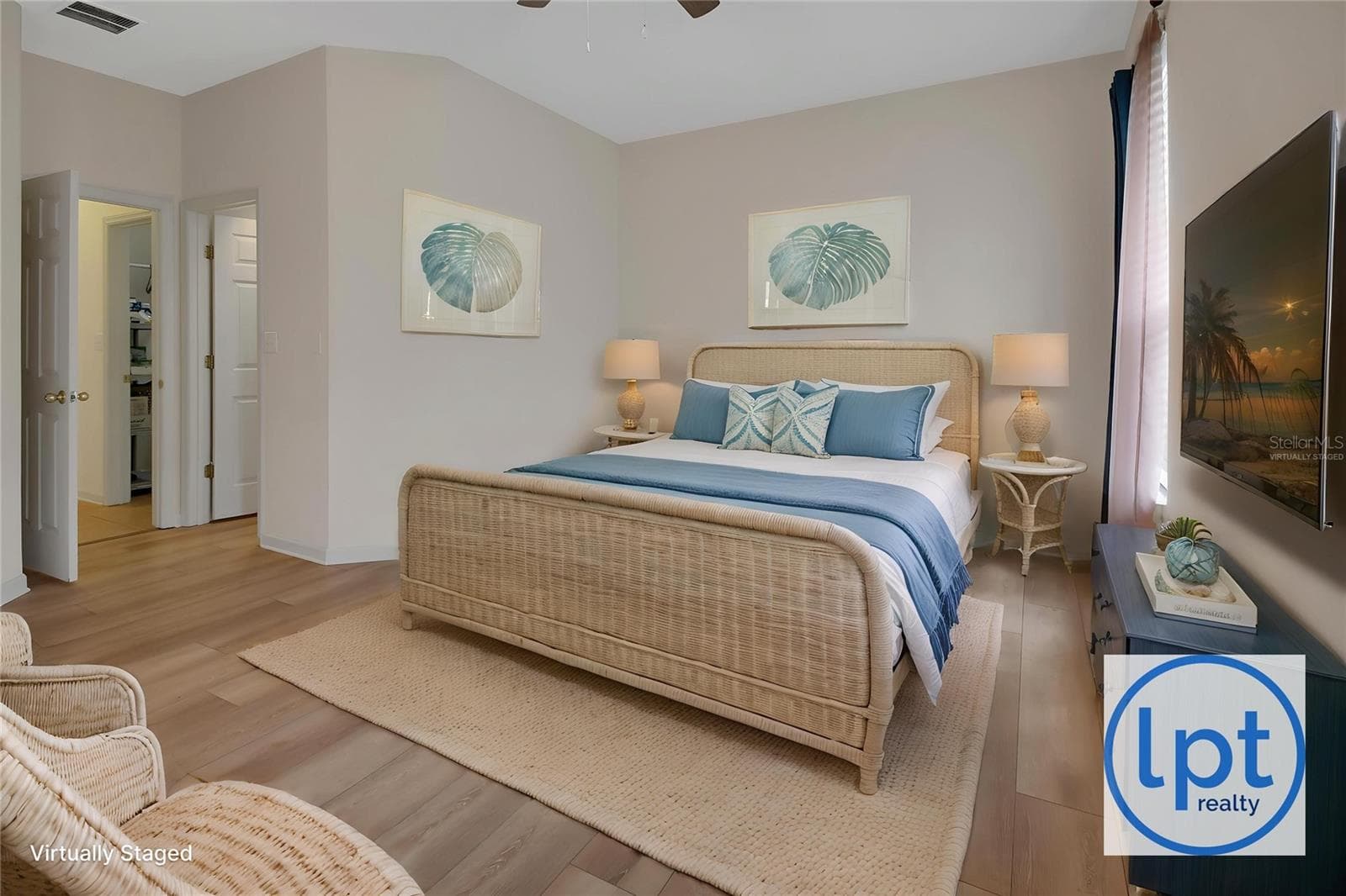 virtually staged primary bedroom from different angle - 525 HERON POINT WAY, DELAND