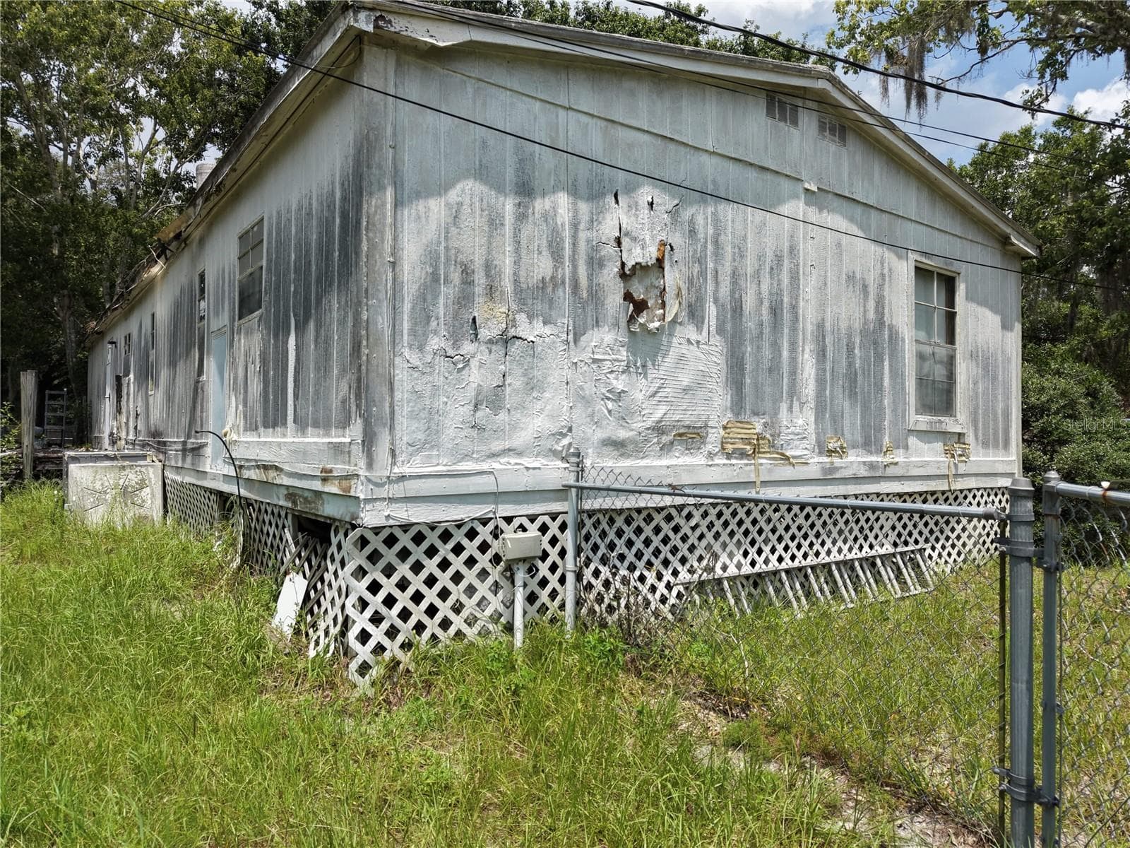 Manufactured Home at 18440 AMITYVILLE DR, ORLANDO, photo 14 of 16