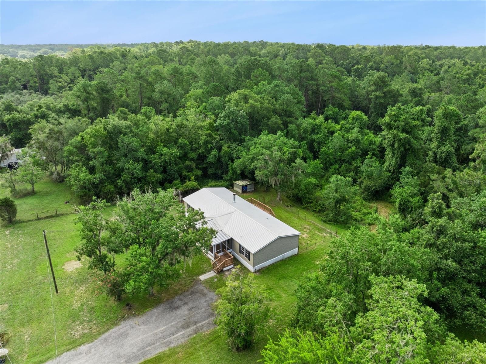 Aerial Side view of house and property - 129 PATRICIAN PL, SATSUMA