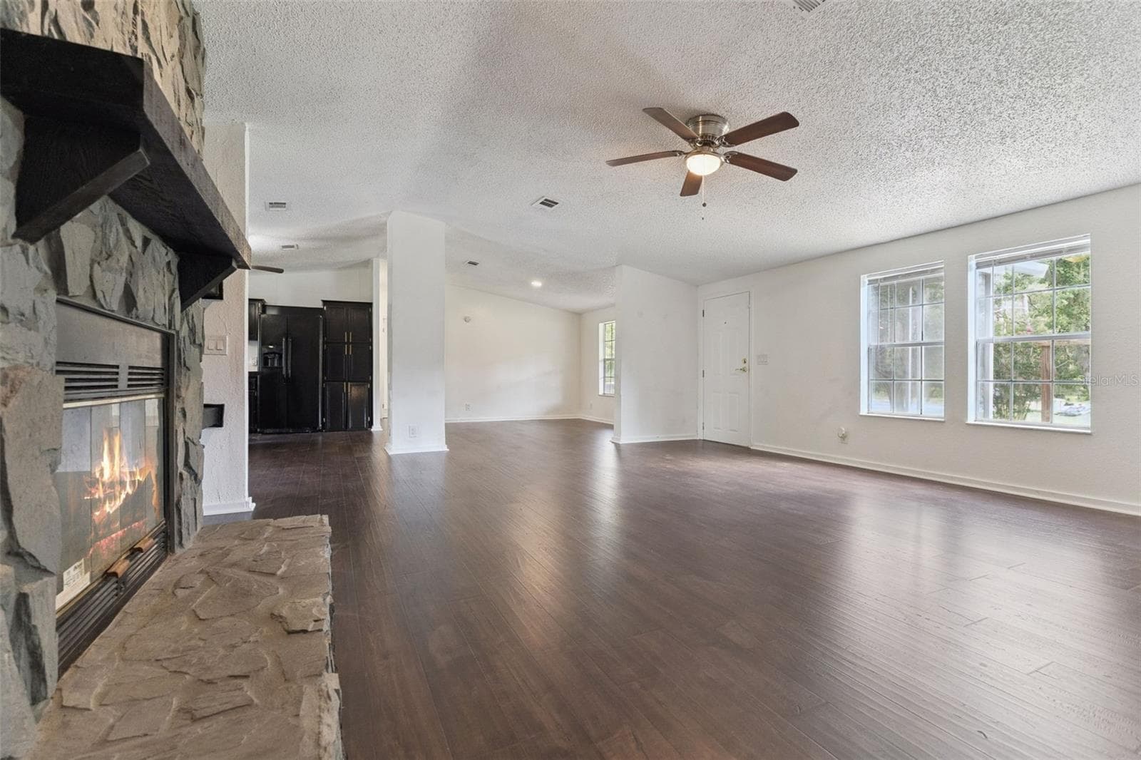 view from master bedroom through Great room - 129 PATRICIAN PL, SATSUMA