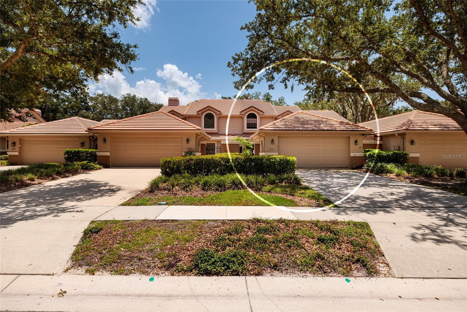 Front view with unit circled - 17557 FAIRMEADOW DR, TAMPA