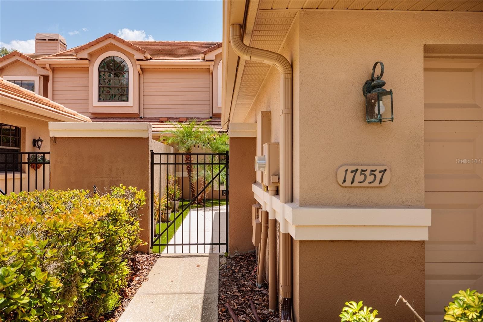 Front gate entrance to unit - 17557 FAIRMEADOW DR, TAMPA
