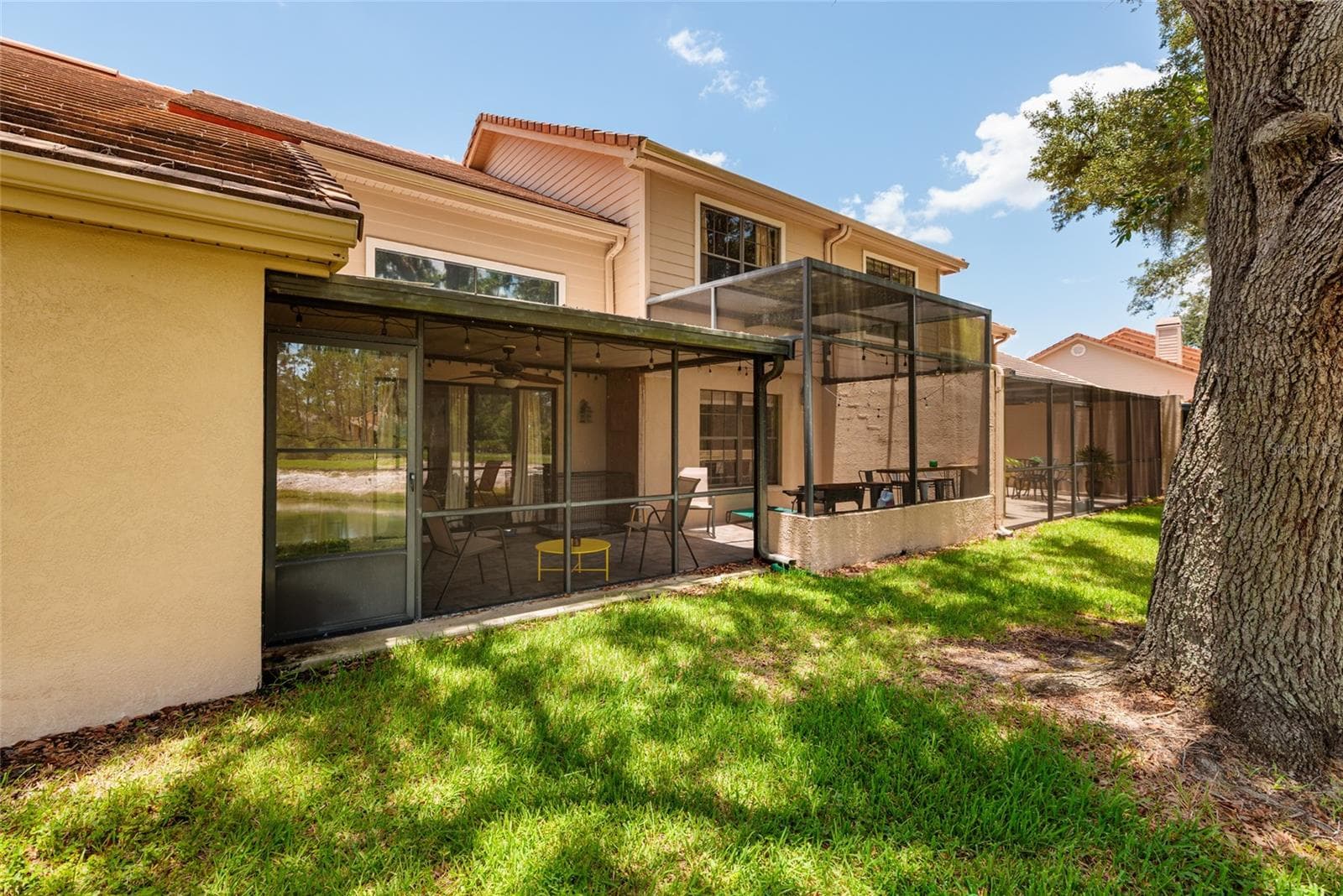 yard view back of unit - 17557 FAIRMEADOW DR, TAMPA