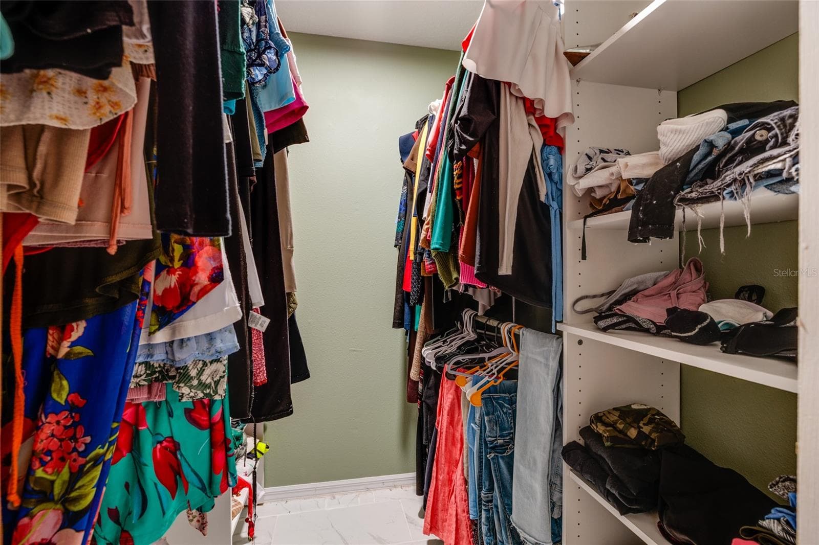 master walk-in closet - 17557 FAIRMEADOW DR, TAMPA