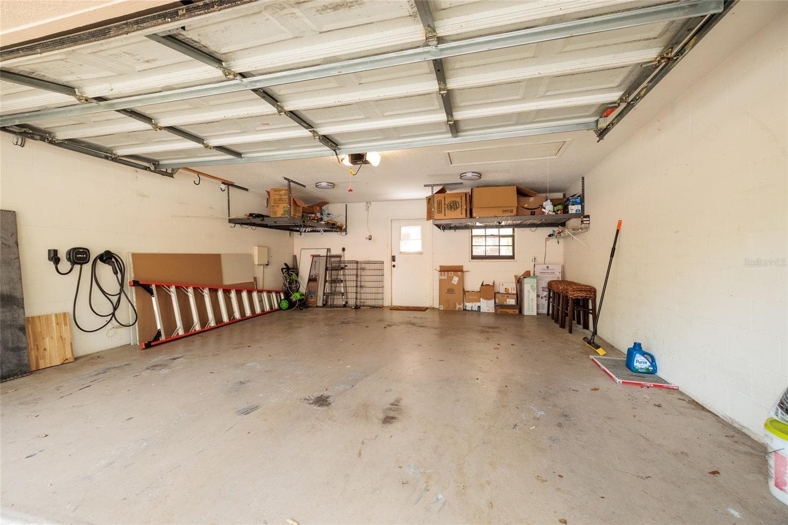 2 car garage - 17557 FAIRMEADOW DR, TAMPA