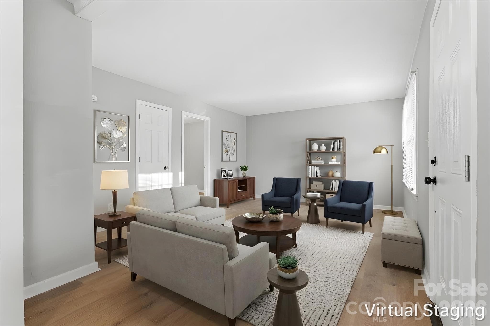 Opening the front door & walking into the main living area (virtually staged & enhanced). - Charlotte