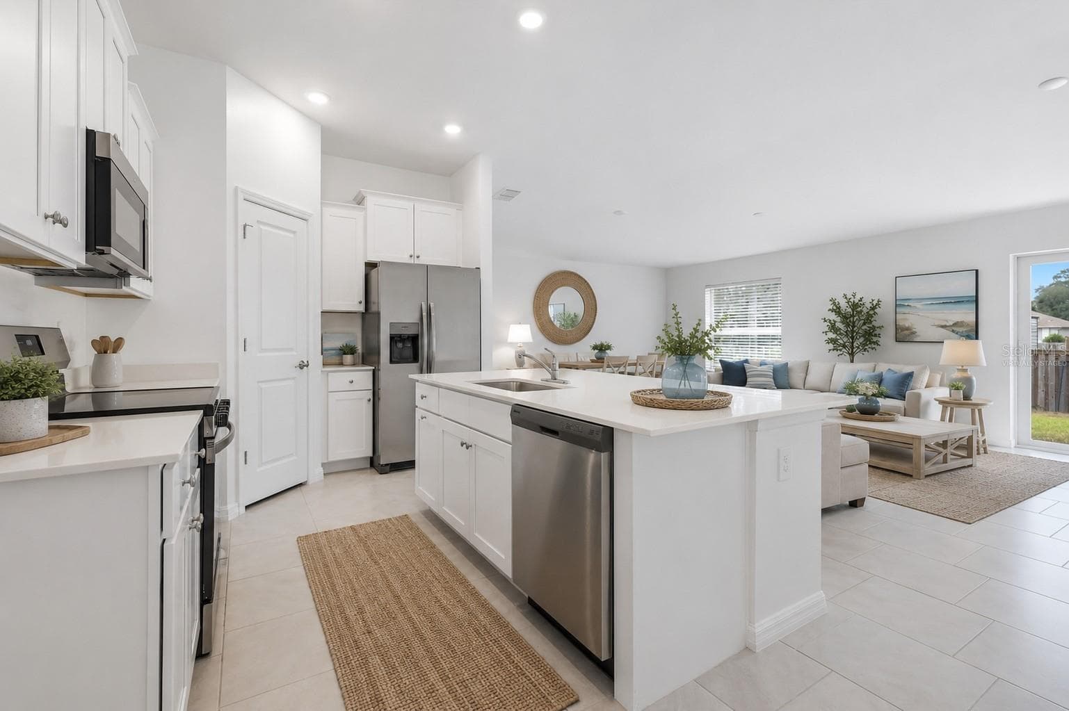 Virtually Staged Kitchen and Living Room - 1403 AKEN ST, PORT CHARLOTTE