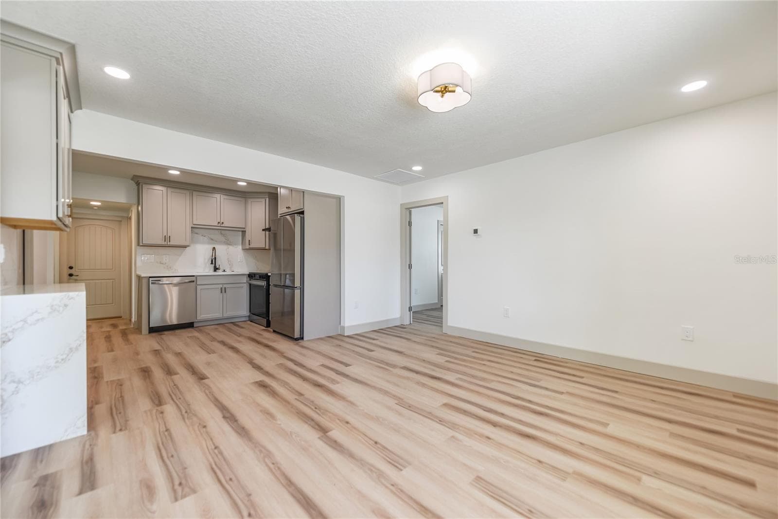Great room and kitchen - 7851 40TH AVE N, ST PETERSBURG