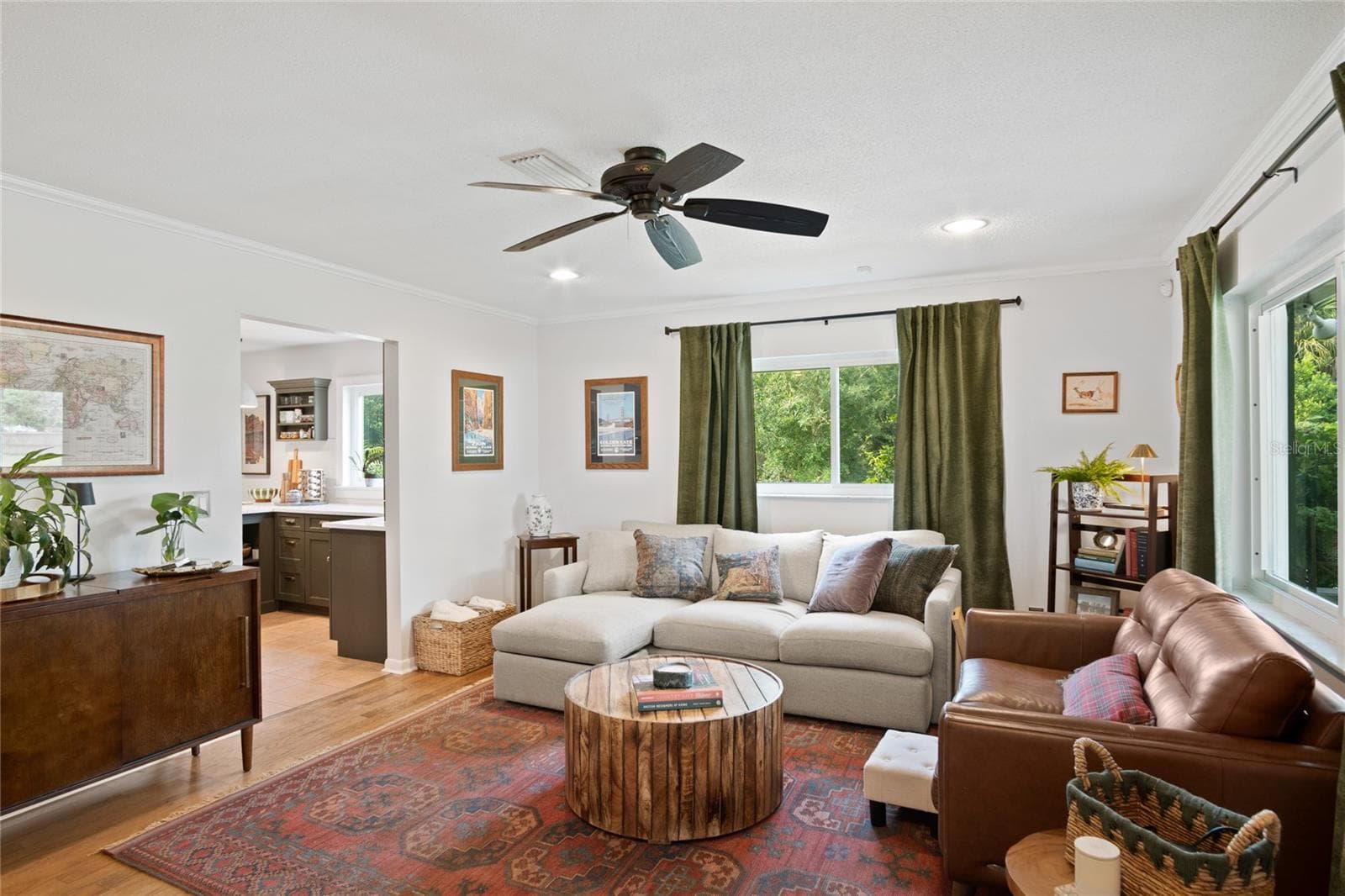 A charming living room with hard wood floors. - 501 MERIDALE AVE, ORLANDO