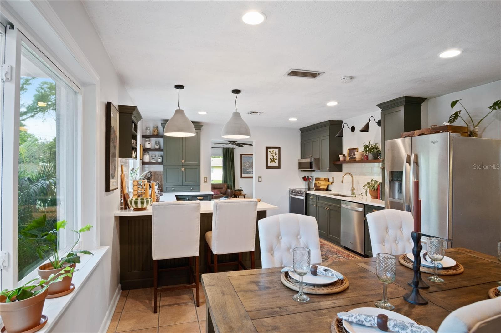 Spacious and well lit remodeled kitchen and dining room. - 501 MERIDALE AVE, ORLANDO