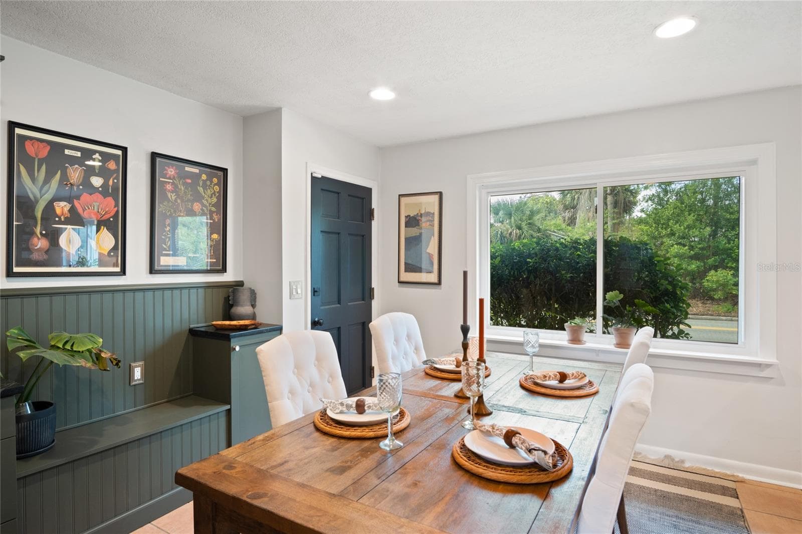 The remodeled dining area leading to the double car garage. - 501 MERIDALE AVE, ORLANDO