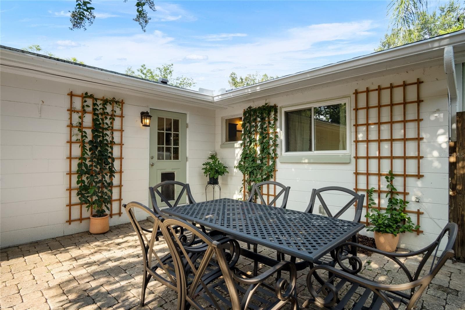 Another view of the brick paver patio. - 501 MERIDALE AVE, ORLANDO