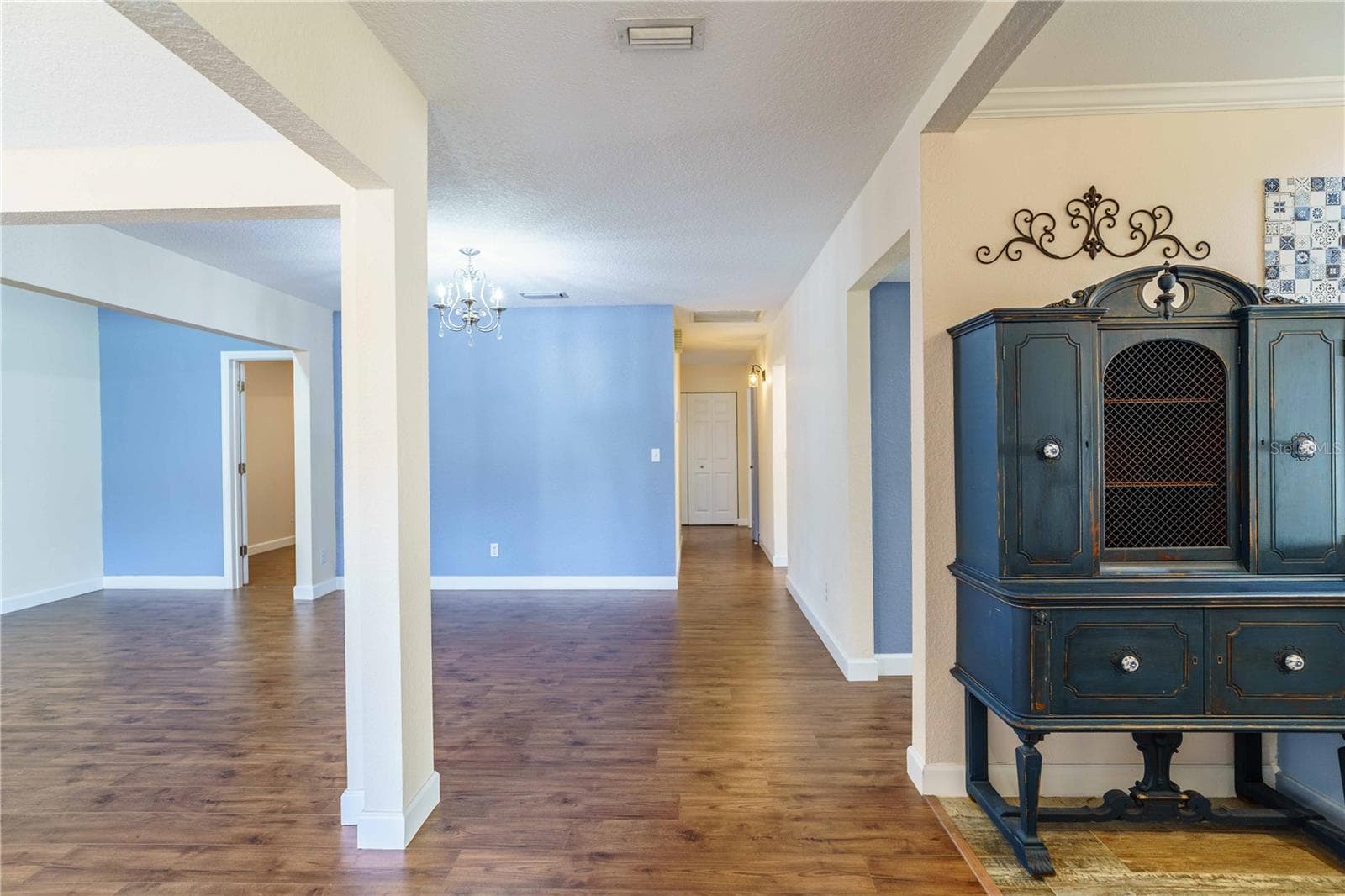 View from front door of great room on left and dining room - 4418 NE 4TH ST, OCALA