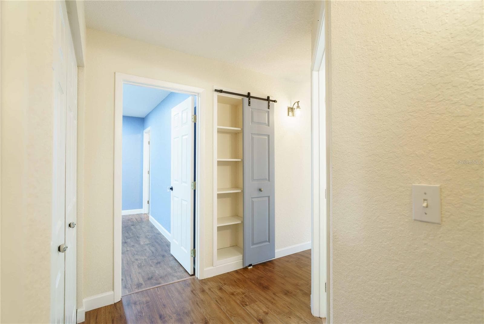 Barn door on linen closet - 4418 NE 4TH ST, OCALA