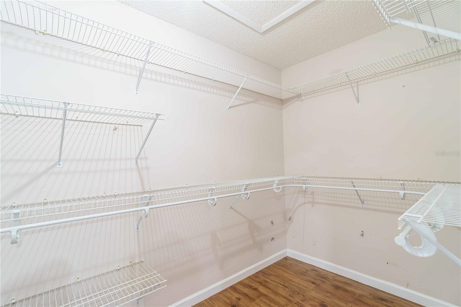 Large walk in closet in primary bedroom - 4418 NE 4TH ST, OCALA