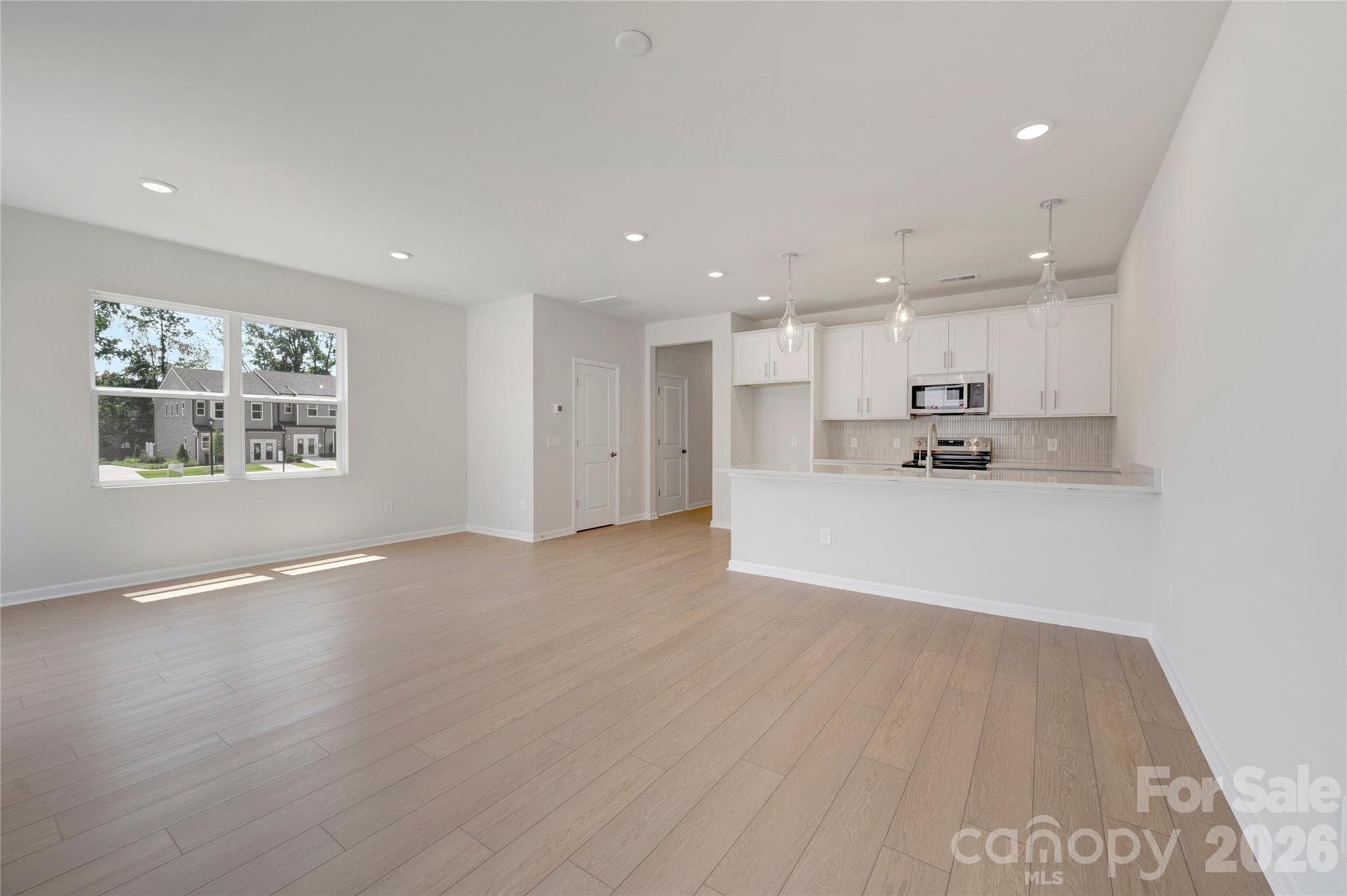End unit added windows for ample natural light - Charlotte