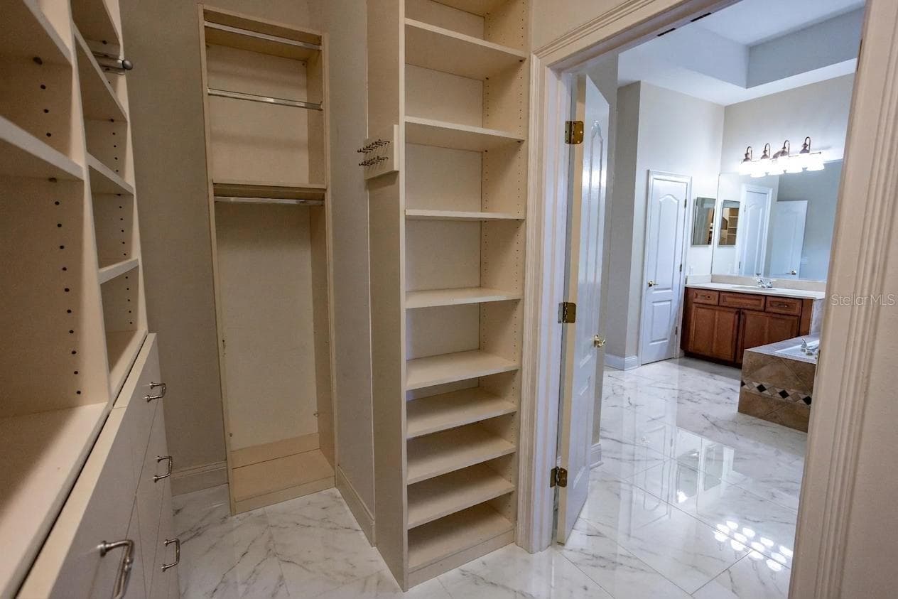 Virtual Flooring Primary Closet/ Bathroom - 25609 HAWKS RUN LN, SORRENTO