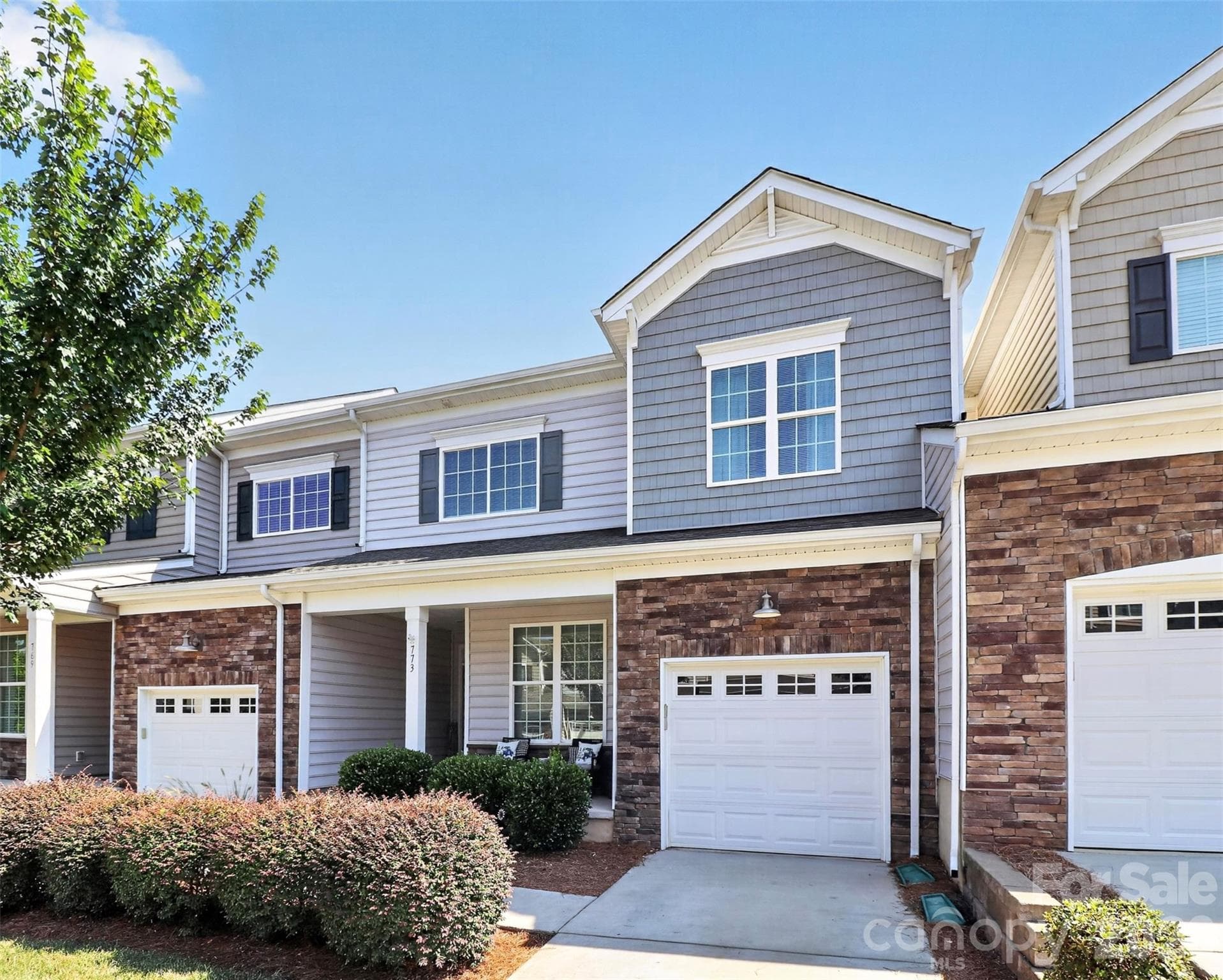 Welcome Home! Thoughtfully designed with inviting curb appeal, a spacious front porch, and low-maintenance living—this beautiful townhome is your gateway to an incredible waterfront lifestyle. - Belmont