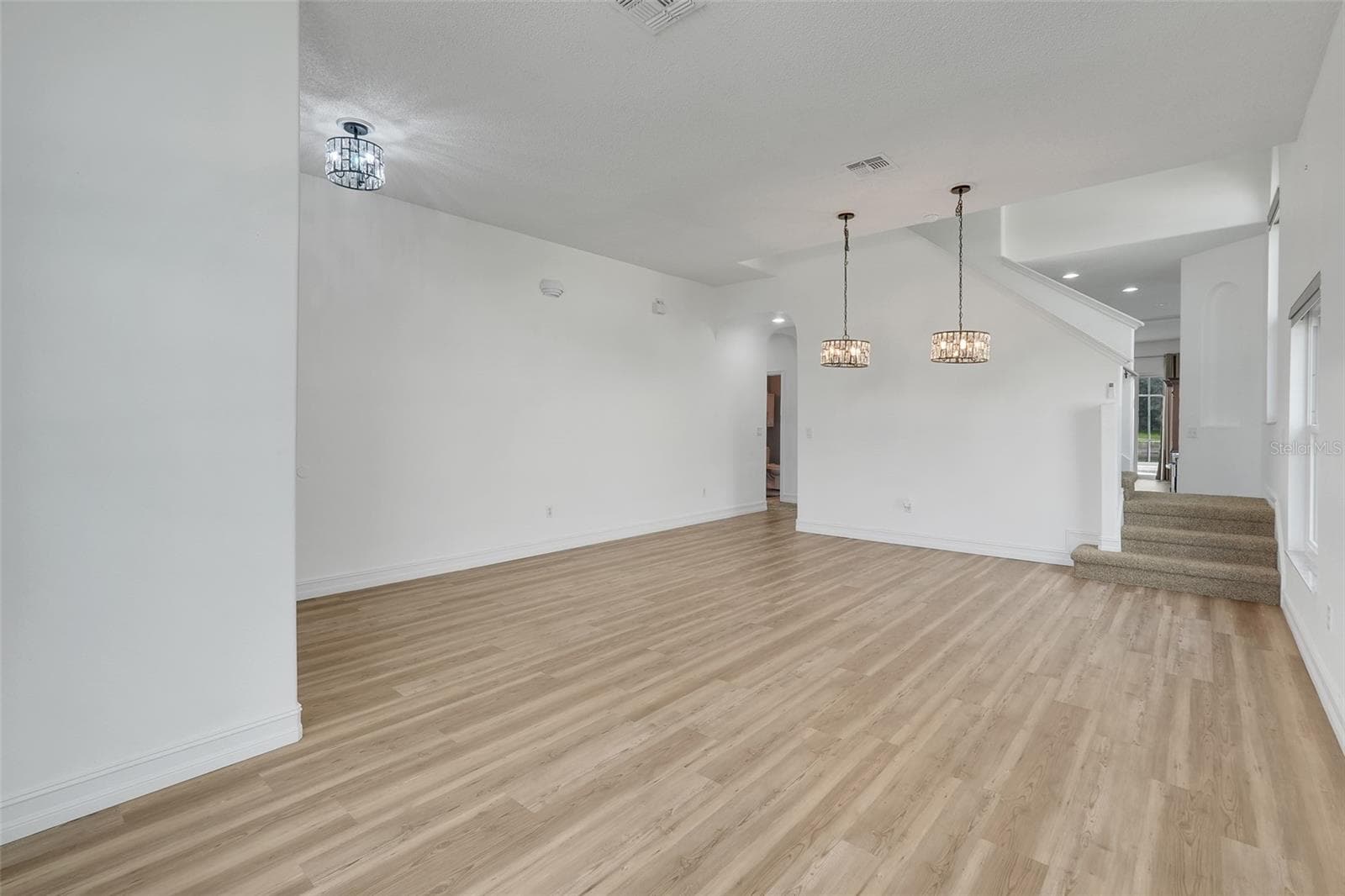 Standing in formal living room looking into dining room - 16740 GLENBROOK BLVD, CLERMONT