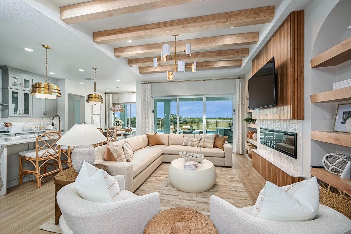Great Room-Photo description represents the model home of same floor plan. - 17524 MACARTHUR LOOP, VENICE