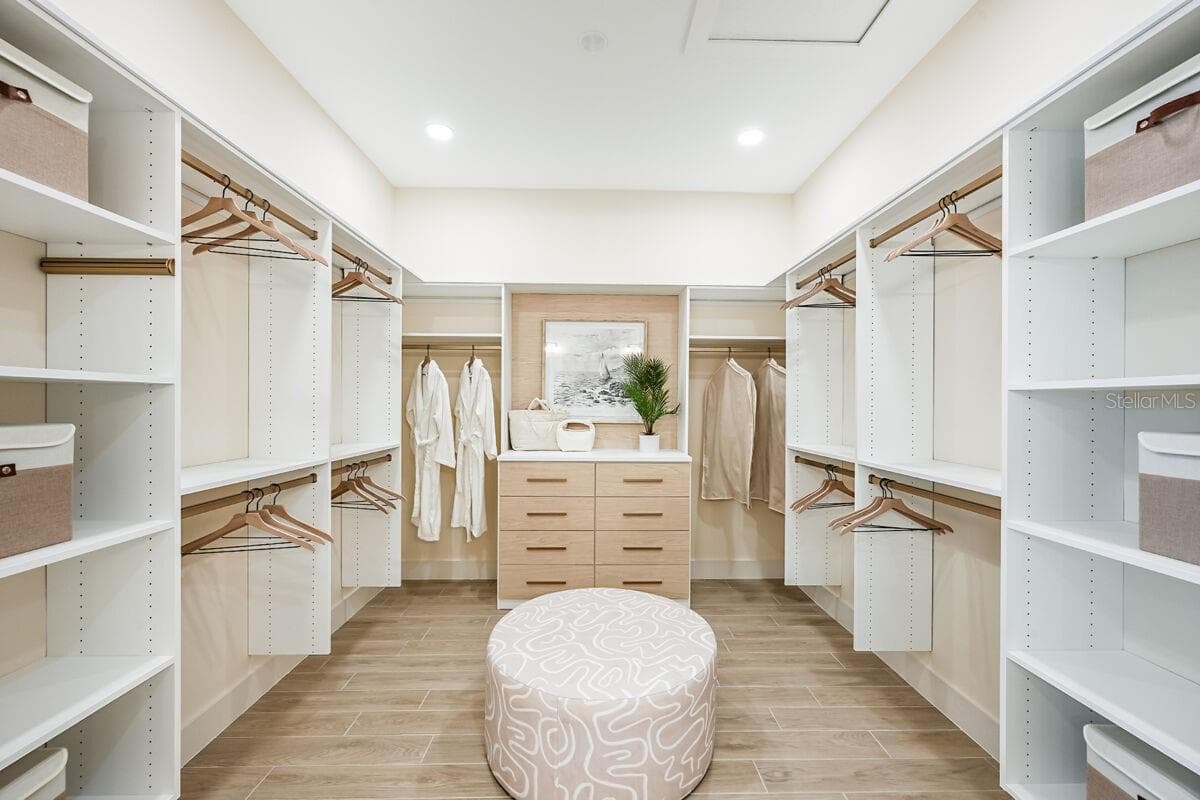 Owners Closet-Photo description represents the model home of same floor plan. - 17524 MACARTHUR LOOP, VENICE