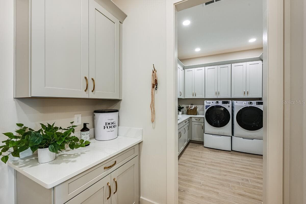 Laundry-Photo description represents the model home of same floor plan. - 17524 MACARTHUR LOOP, VENICE