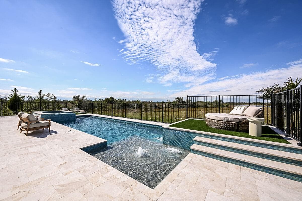Lanai-Photo description represents the model home of same floor plan. - 17524 MACARTHUR LOOP, VENICE