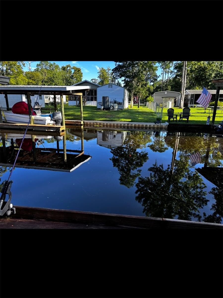 From back of property toward water - 104 EDGEWATER RD, SATSUMA