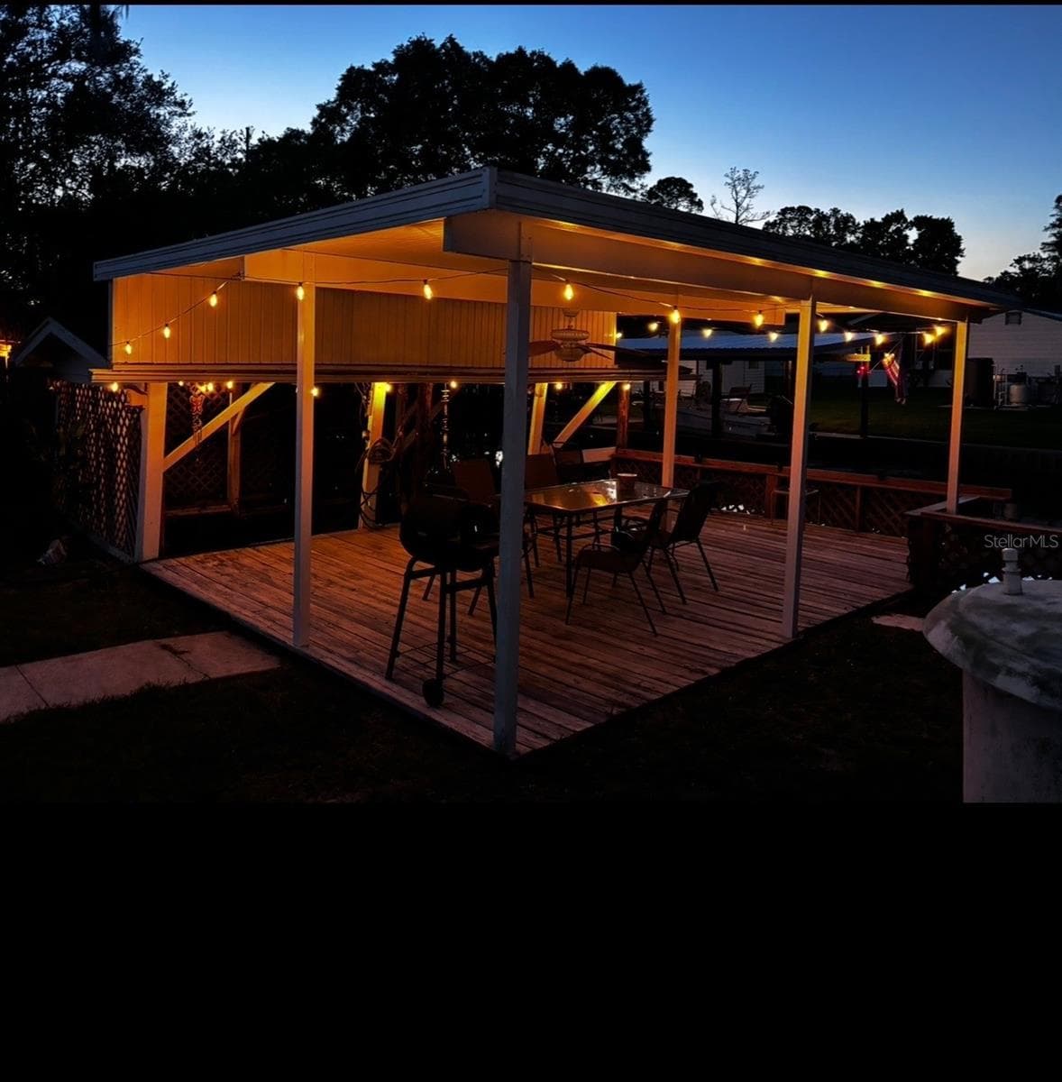 A picture in the evening, provided by seller - 104 EDGEWATER RD, SATSUMA