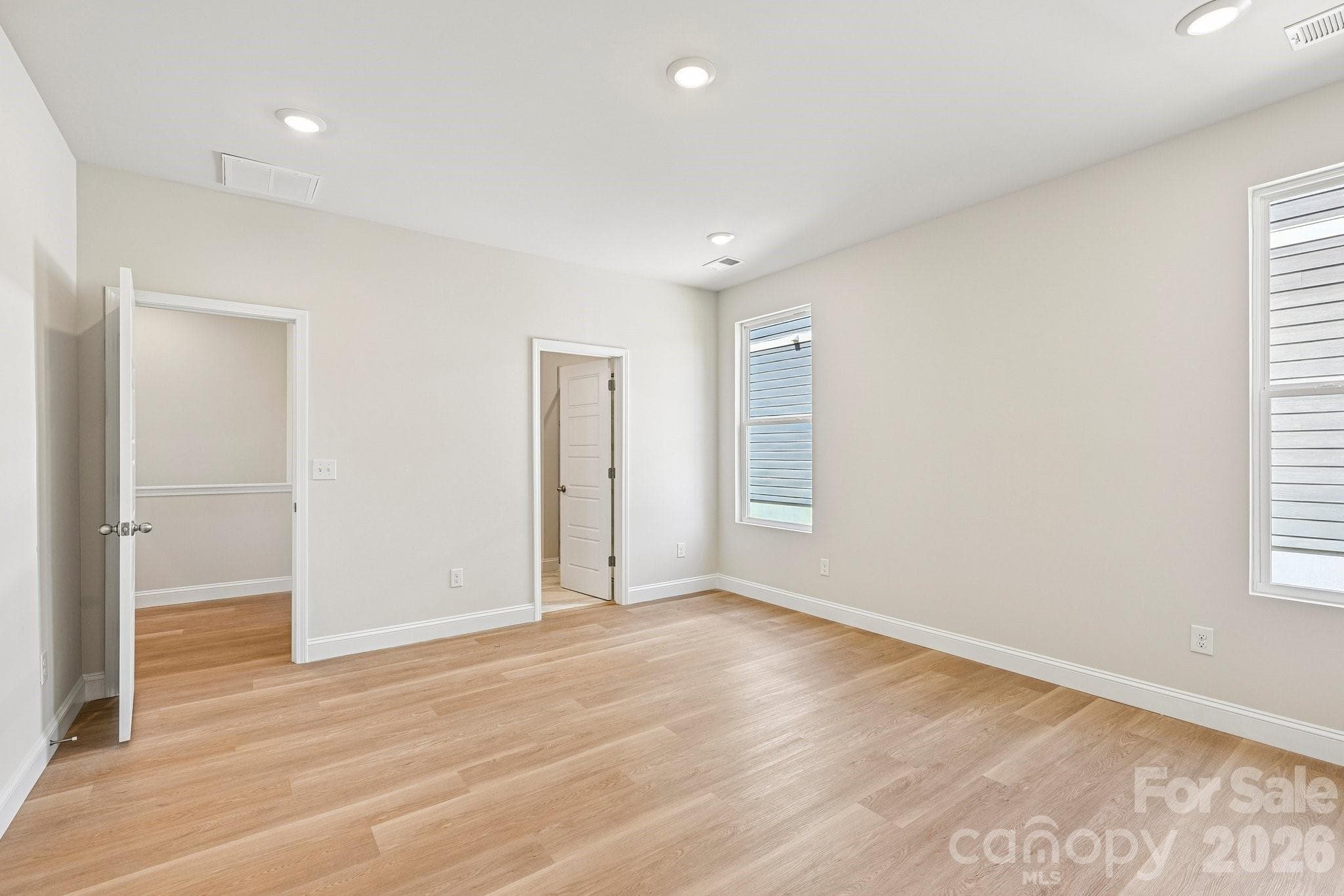 Primary bedroom on main/upper level - 605 Banter Lane, Gastonia