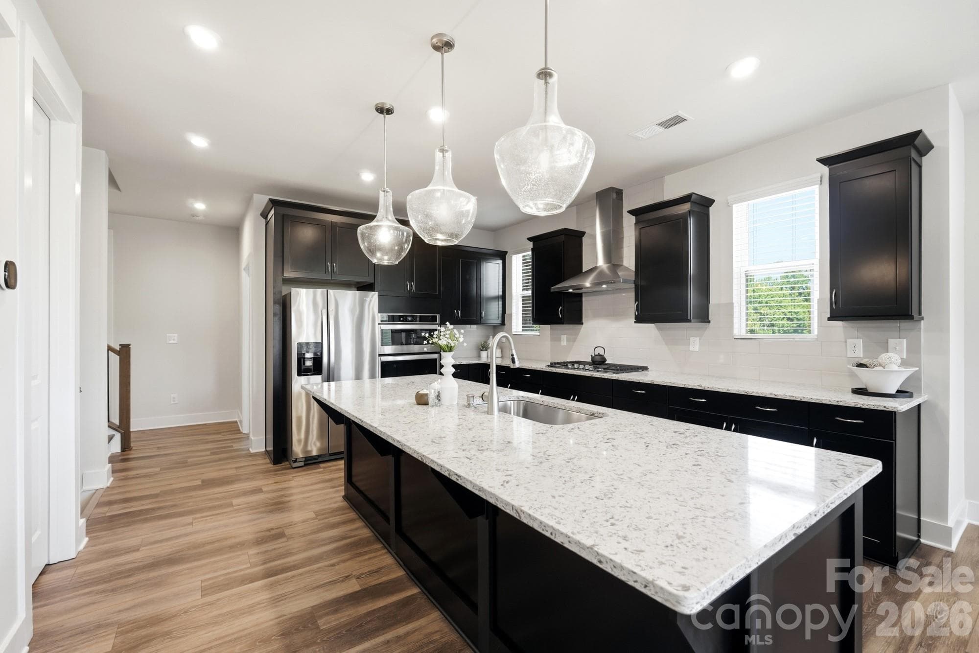 Huge island with lots of seating room - 2745 Ensemble Court, Charlotte