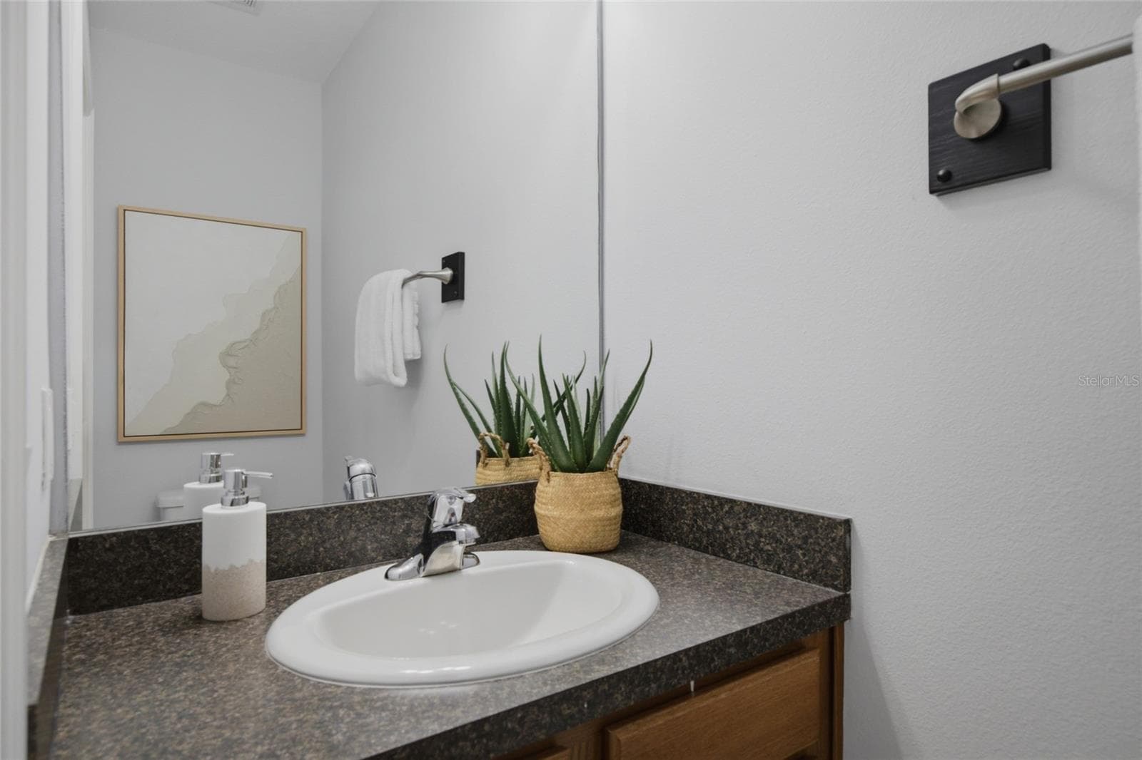 First floor half bath off of living room - 485 HARBOR RIDGE DR, PALM HARBOR