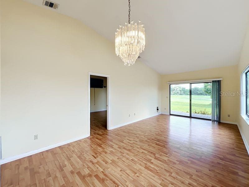 Entrance to Primary Bdrm from Living Area (previous flooring) - 340 GOLFSIDE CV #340, LONGWOOD