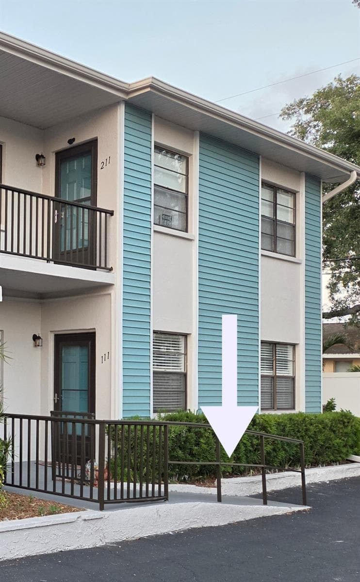 Walkway Ramp from the parking area right to your front door! - 5925 TERRACE PARK DR N #111, ST PETERSBURG