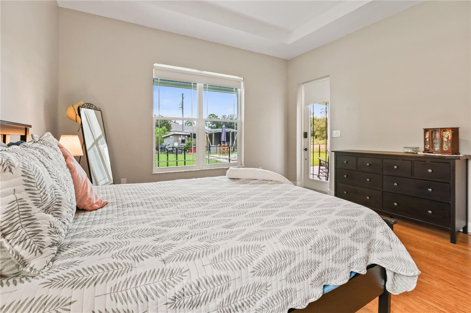 Primary Bedroom w/ door to back porch - 306 CALENDAR ST, PORT CHARLOTTE