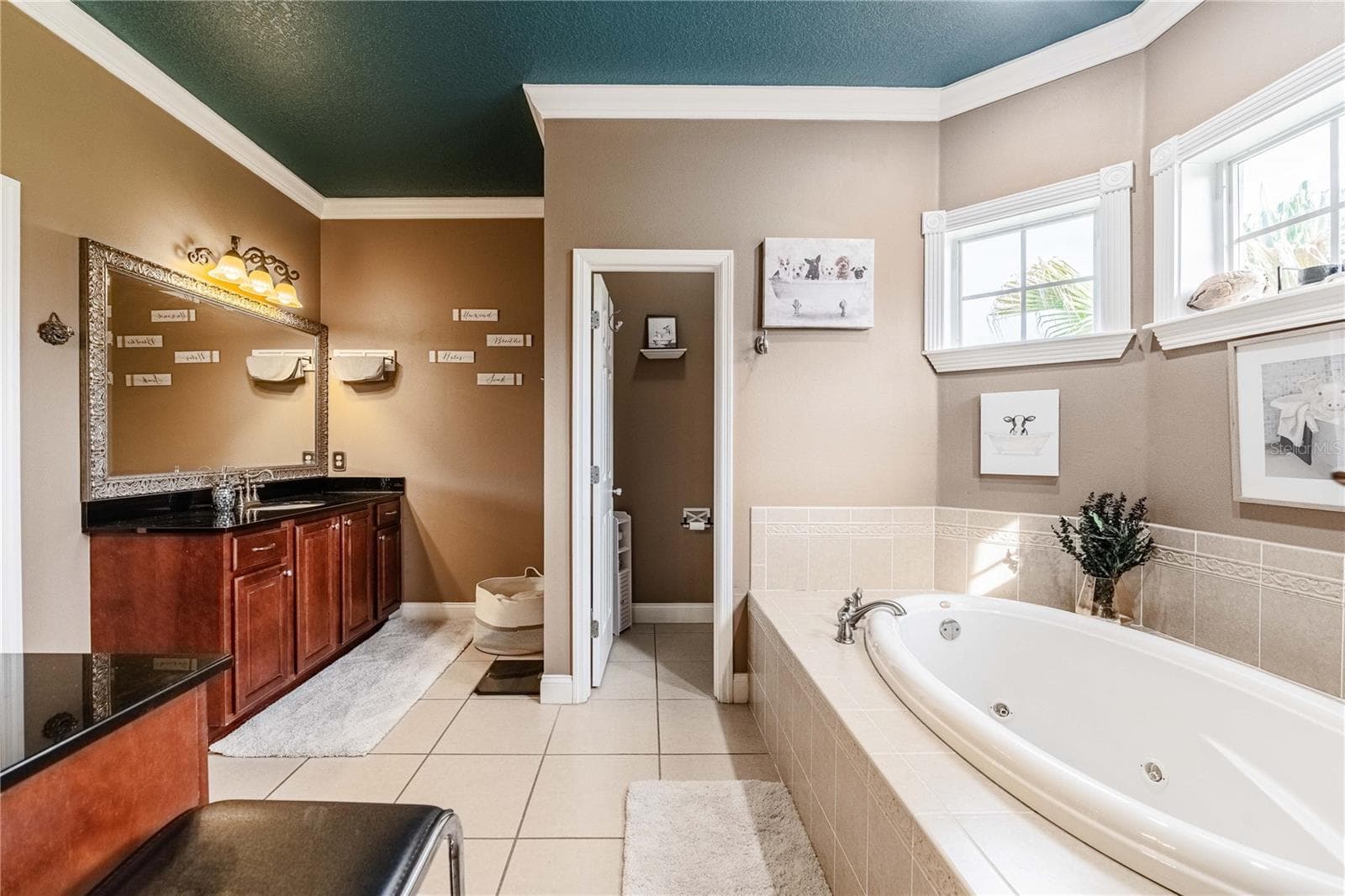 Primary bathroom with dual sinks and vanities - 4280 TURNER RD, MULBERRY