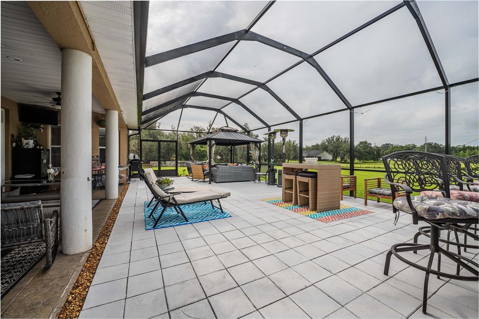 Lanai overlooks the sprawling back acreage - 4280 TURNER RD, MULBERRY