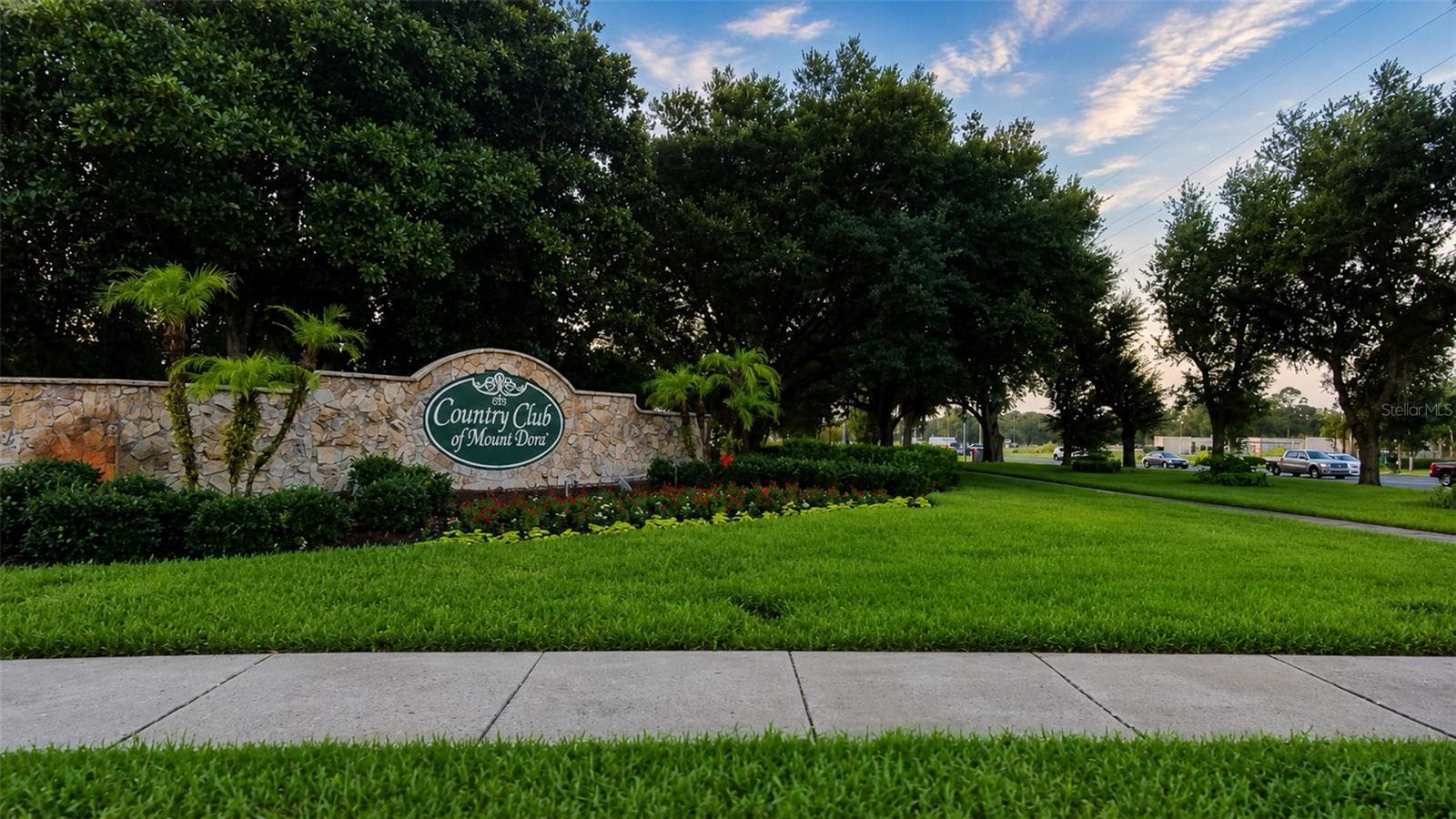 Country Club of Mount Dora entrance at US 441 Hwy at sunrise. - 8027 SAINT ANDREWS WAY, MOUNT DORA
