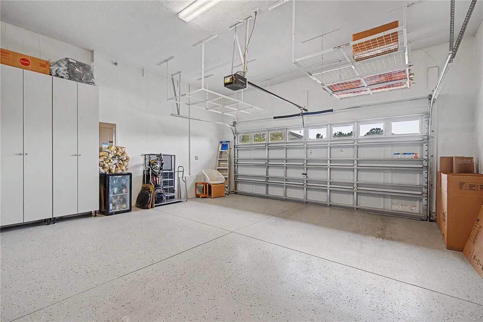2 car garage with loads of storage - 4926 SOUTHERN VALLEY LOOP, BROOKSVILLE