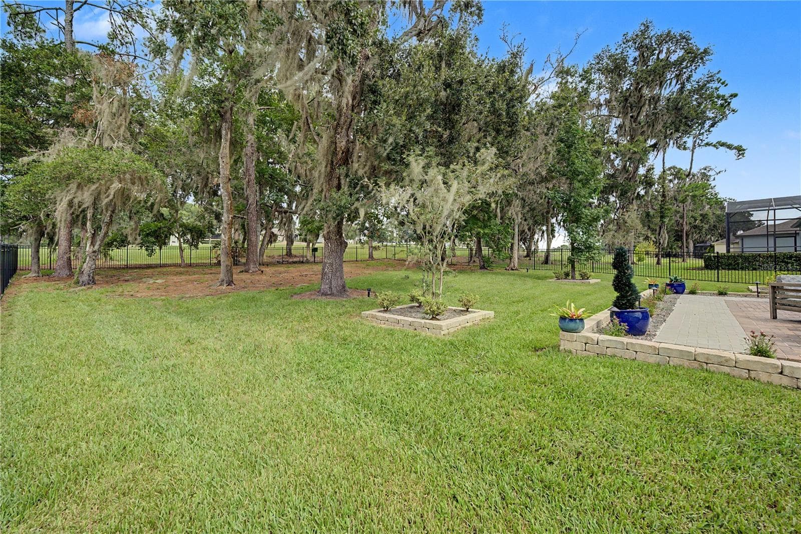 Huge fenced backyard with golf course beyond. - 4926 SOUTHERN VALLEY LOOP, BROOKSVILLE