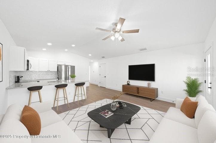 Living roomVirtually staged - 12470 BARNEVELDE ROAD, WEEKI WACHEE