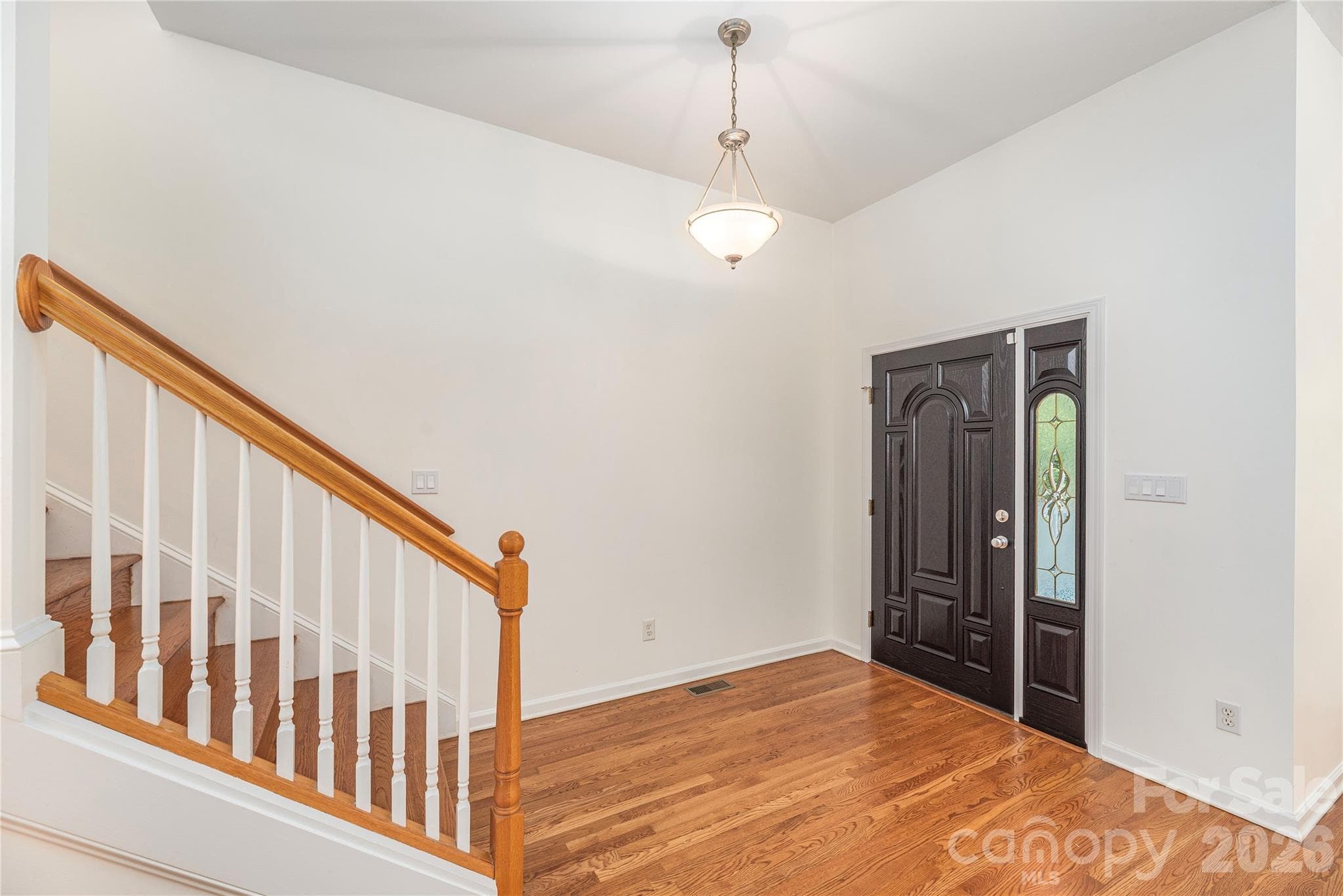 Entry Foyer with Refinished Hardwoods - 602 Hidden Springs Drive, Asheville