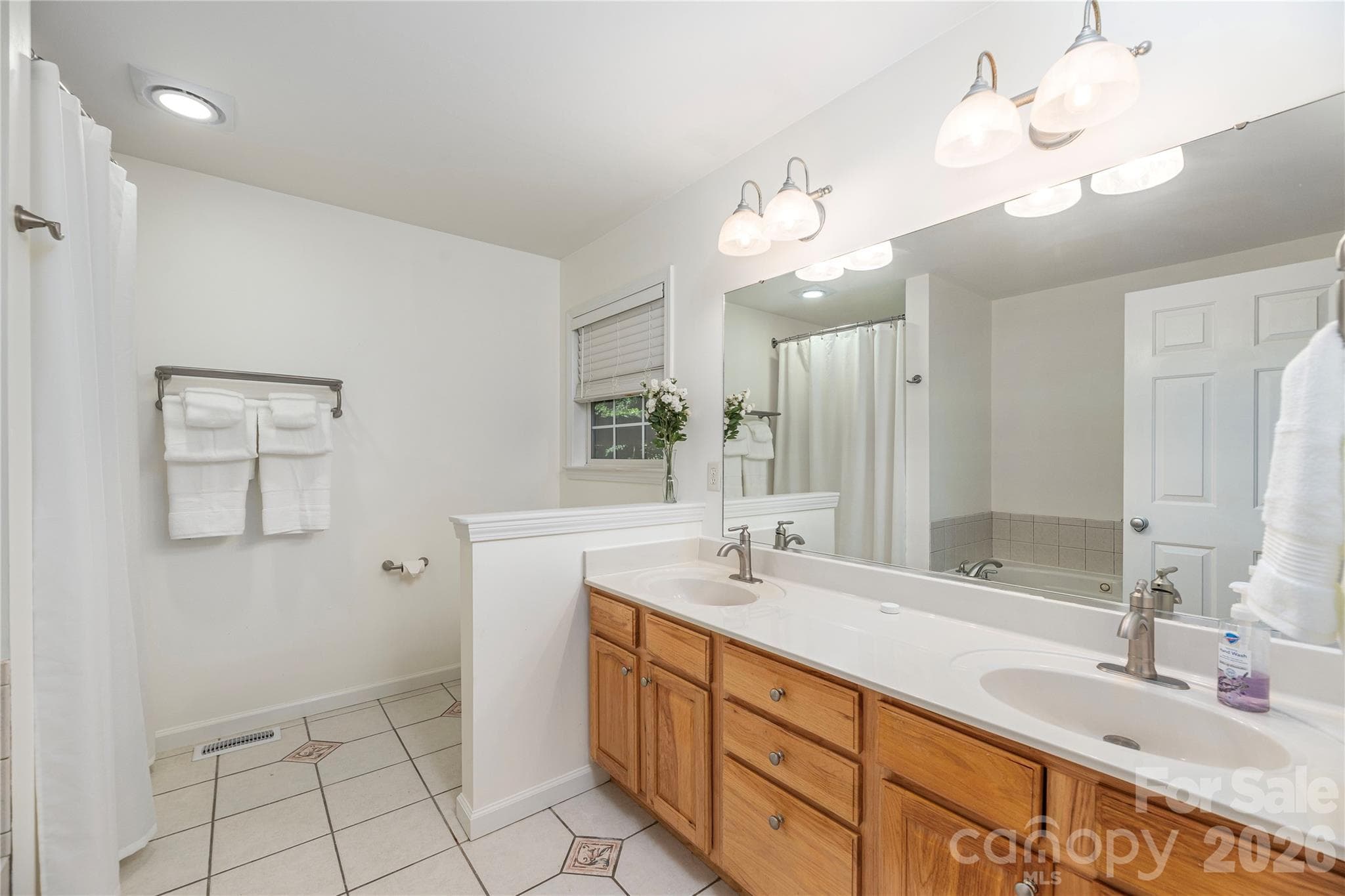 Primary Bath with Double Vanities - 602 Hidden Springs Drive, Asheville