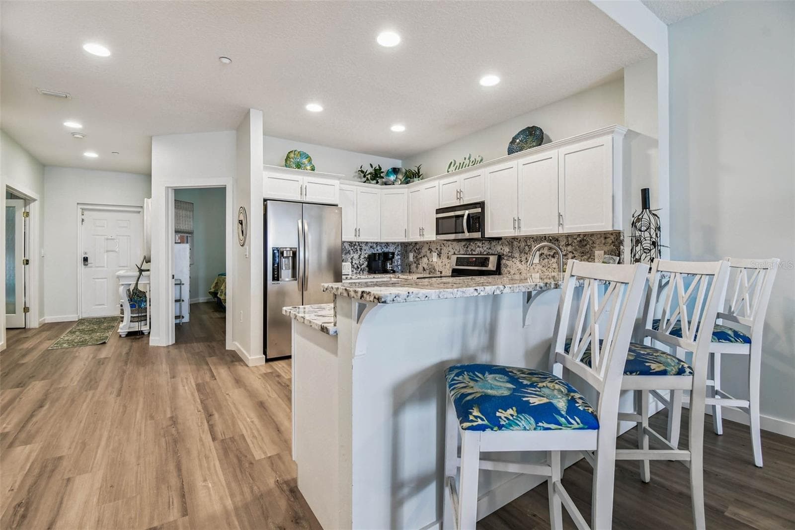 Maintenance-free LVP flooring throughout main areas - 530 S GULFVIEW BLVD #304, CLEARWATER BEACH