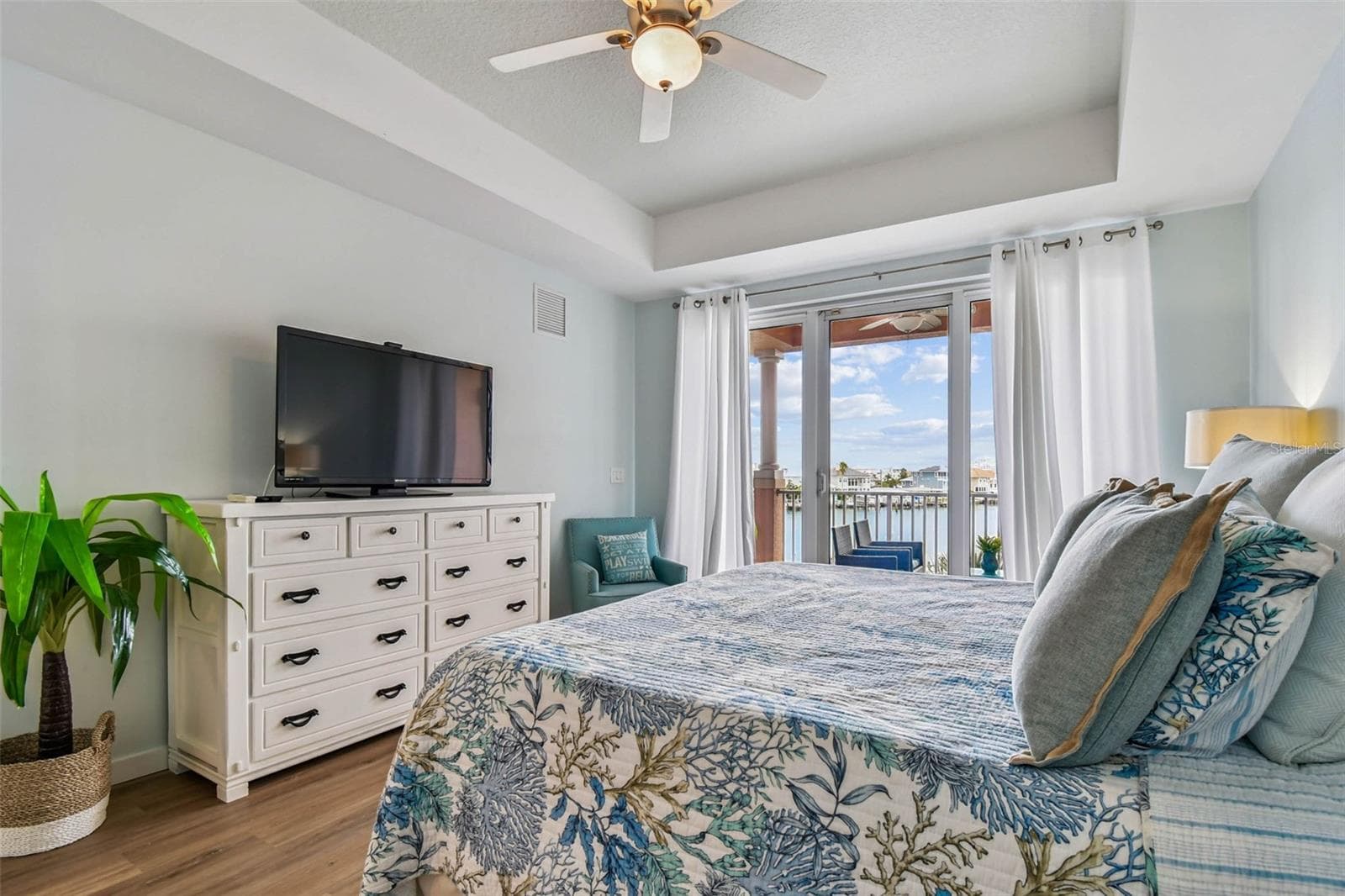 Primary bedroom provides light and views from sliders in master bedroom - 530 S GULFVIEW BLVD #304, CLEARWATER BEACH