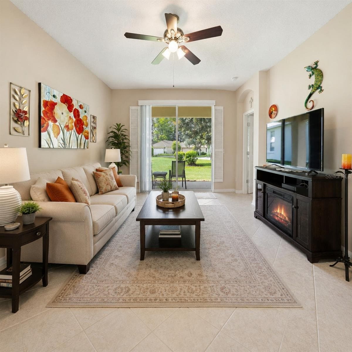 Living room virtally staged - 9076 SAINT ANDREWS WAY, MOUNT DORA