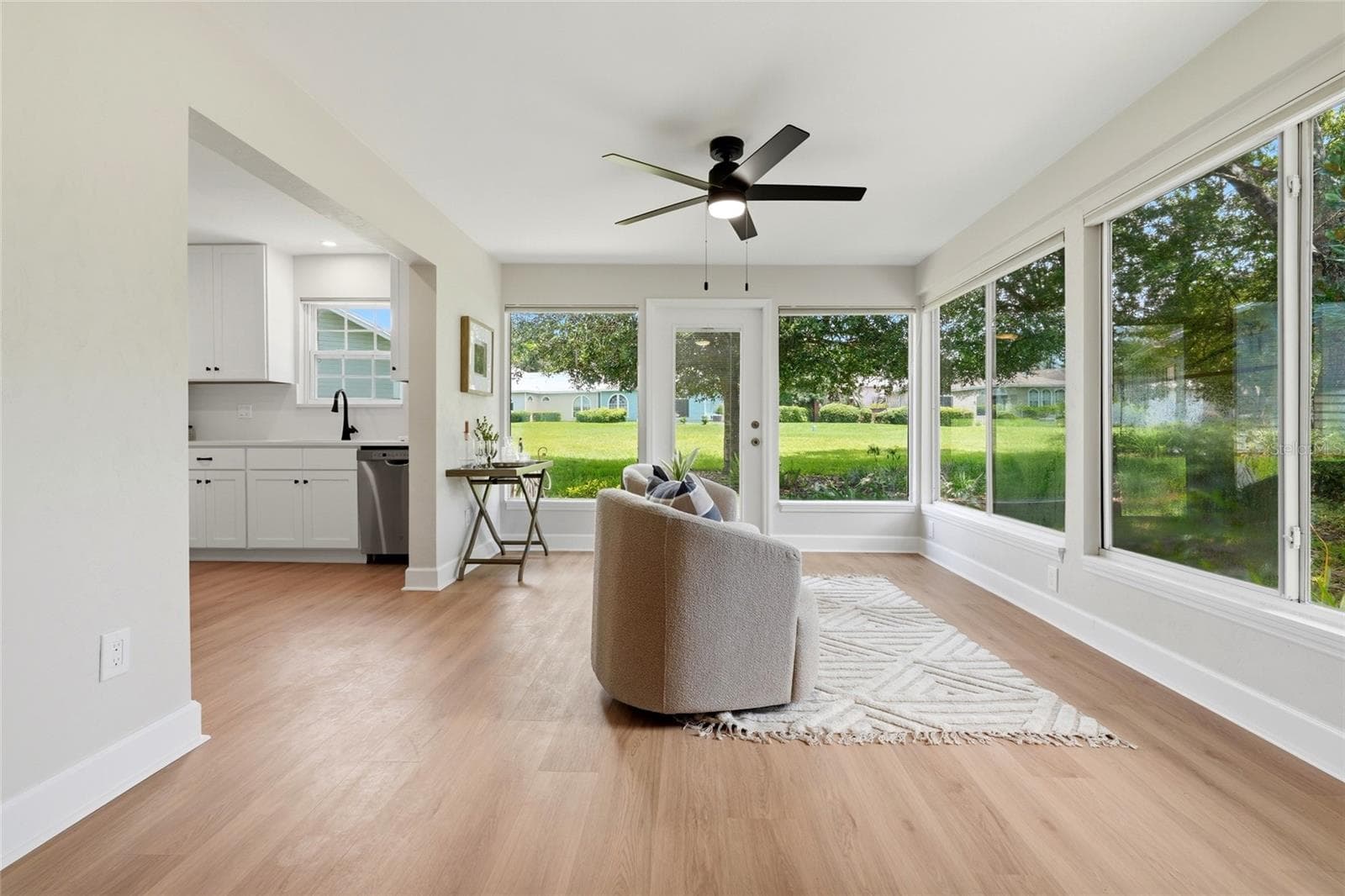 Enclosed porch off of the kitchen and living room - 10521 NW 36TH PL, GAINESVILLE